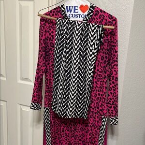 Pink kurta kameez black leopard print with white black trousers. S